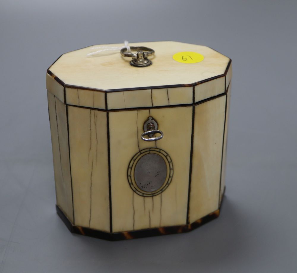 A George III decagonal ivory and tortoiseshell veneered tea caddy, height 10cm